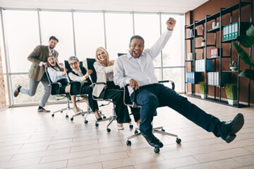 People happy and excited at a meeting