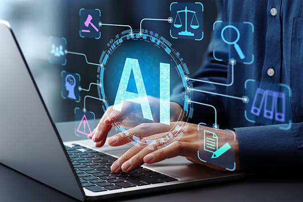 Stock image of AI with person typing on computer